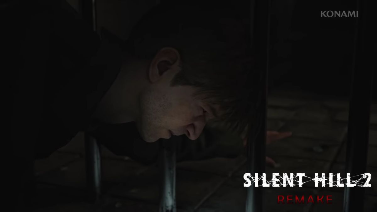 Silent Hill 2 Remake James Sunderland Reaching for item through metal bars