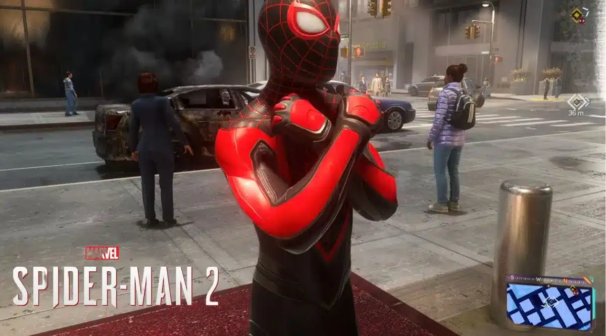 Miles Morales crosses his arms in the Wakanda Forever salute while standing on a New York pavement