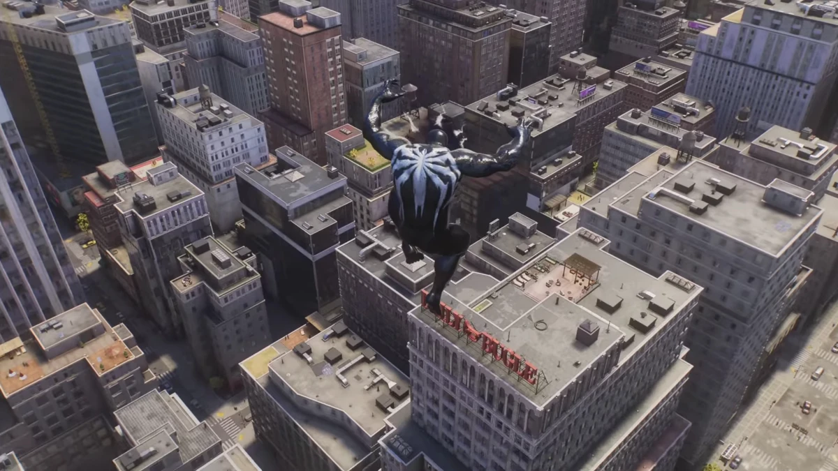 Venom jumping off a tall NYC building in Marvel's Spider-Man 2 PS5 gameplay.