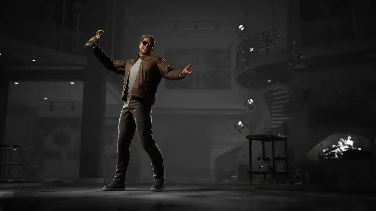 Johnny Cage wearing sunglasses, a brown leather jacket and dark trousers in his Mortal Kombat II movie-inspired outfit.