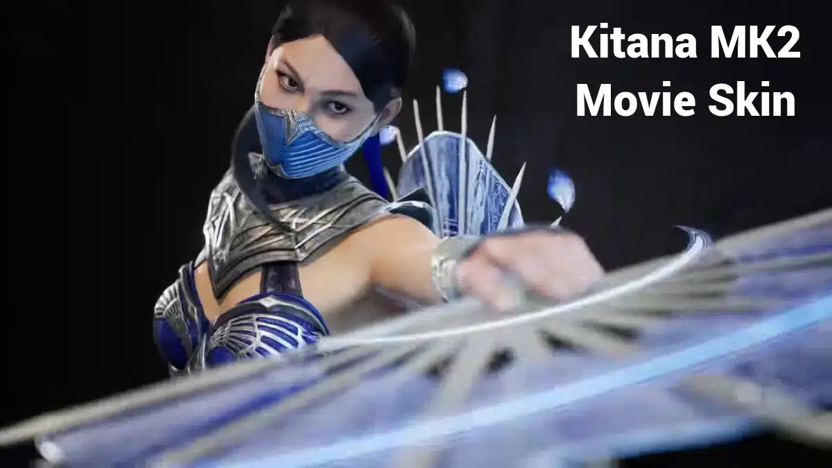 Kitana wearing a blue face mask and dark blue armour while attacking with her bladed fan in Mortal Kombat 1.