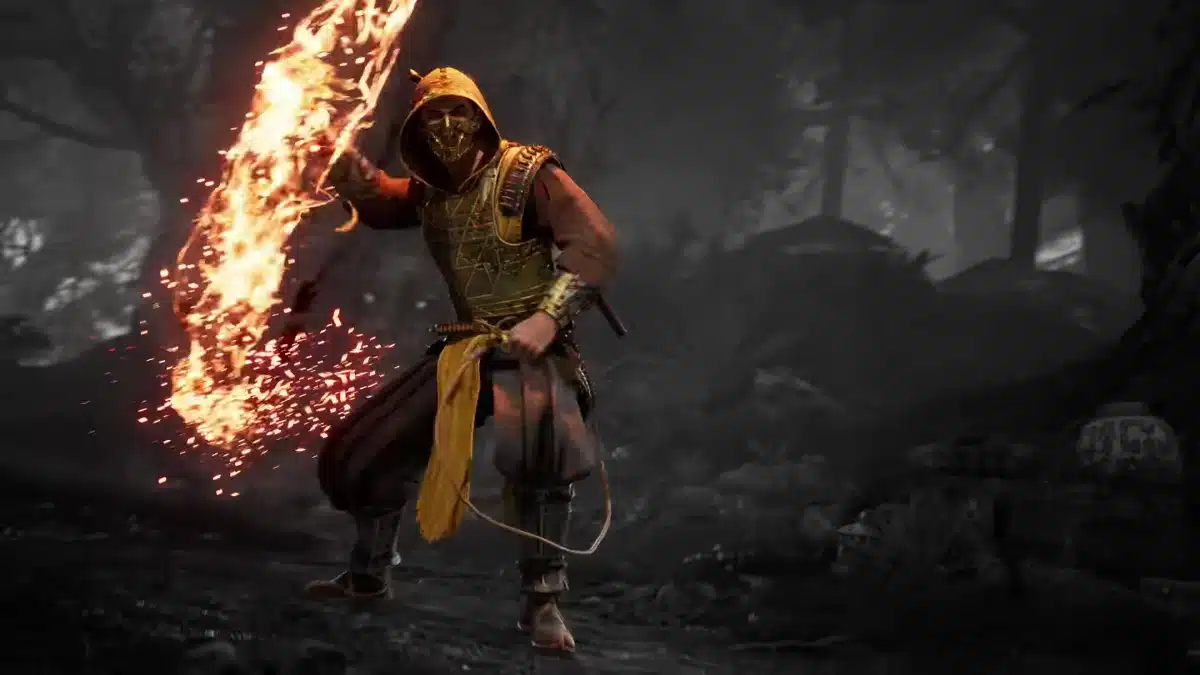 Scorpion wearing a yellow hood and gold face mask while swinging a flaming weapon in his Mortal Kombat II movie skin.