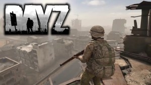 A soldier in military gear stands on a rooftop overlooking a war-torn city. The logo for "DayZ" is in the upper left corner.