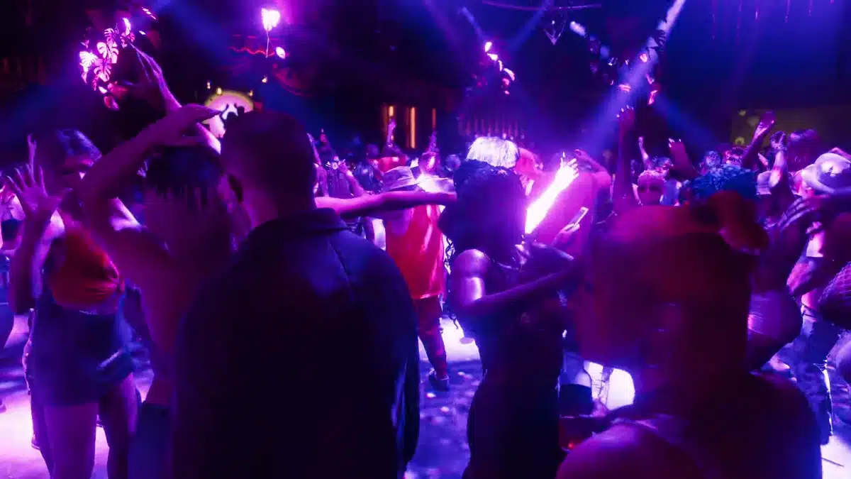 Jason moving through a packed Vice City nightclub in GTA 6