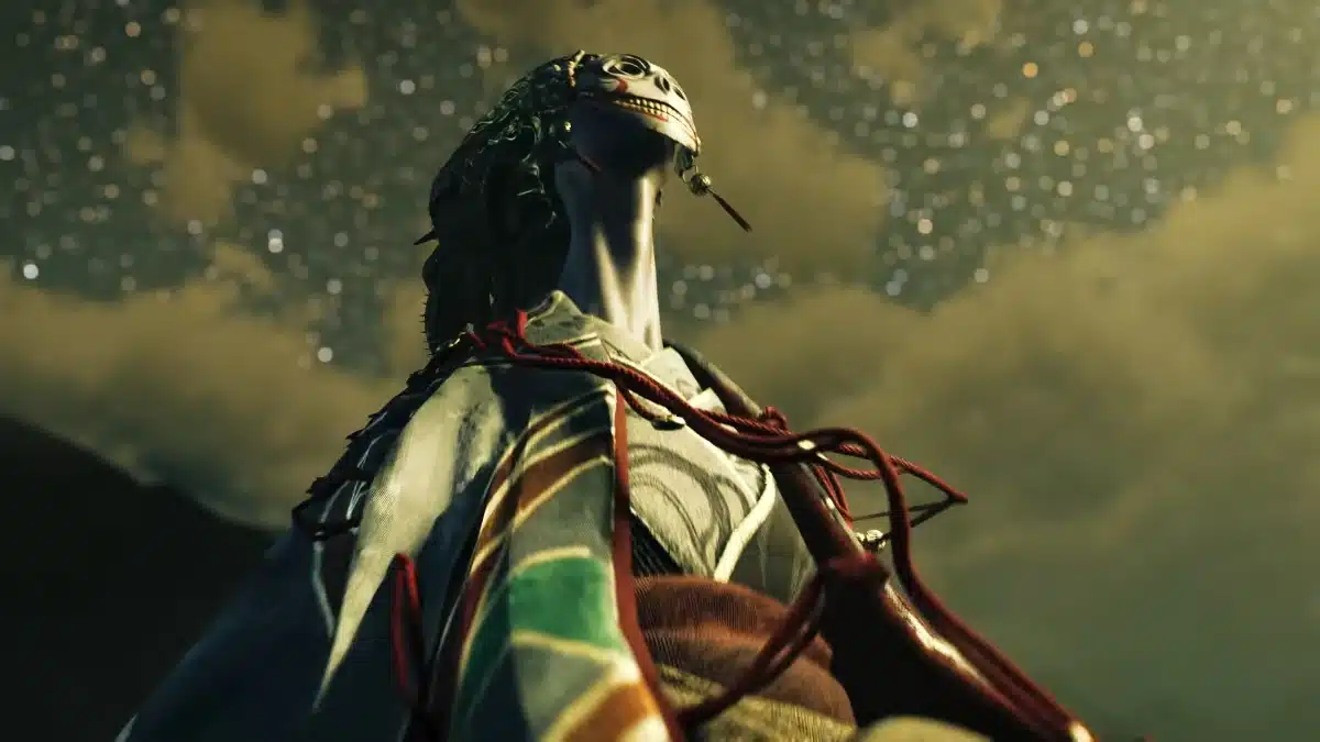 A creature with a reptilian face and green, leafy adornments on its head wears a traditional Japanese garment in muted colors and red cord accents against a cloudy, star-filled sky.
