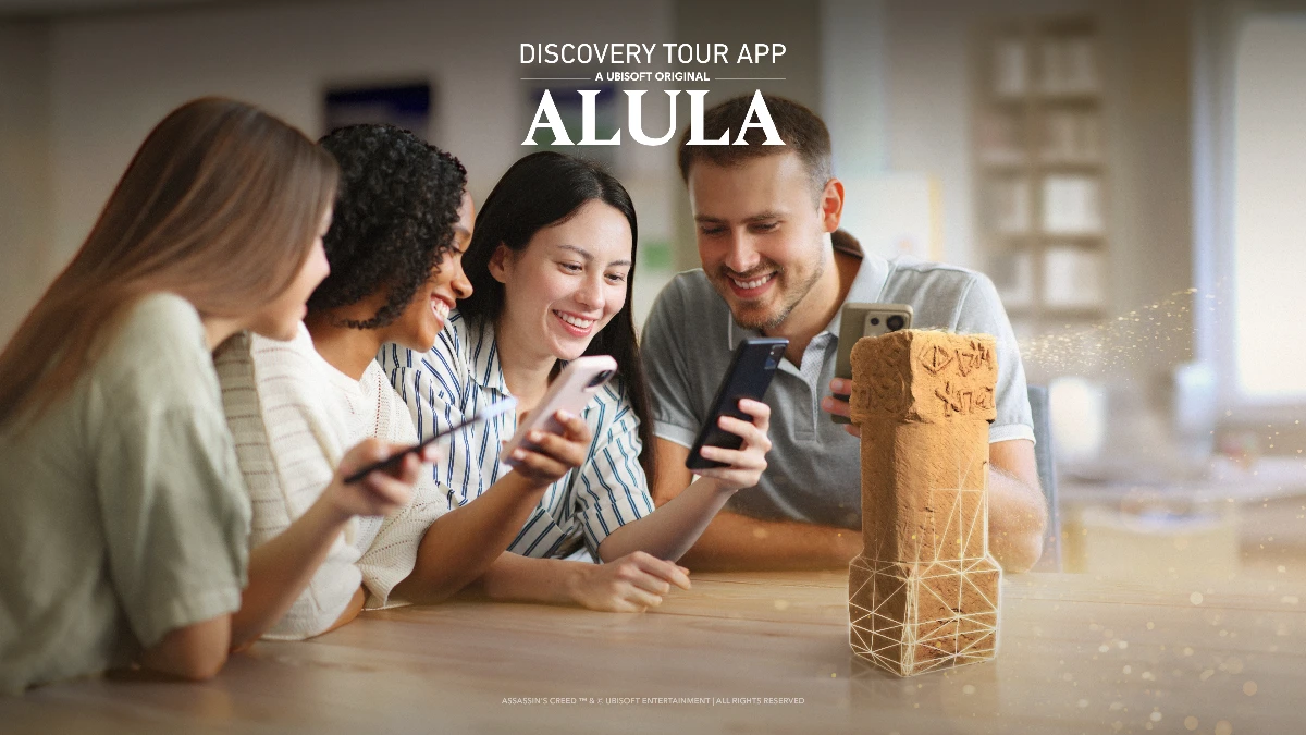 Discovery Tour App AlUla users viewing a historical artefact in augmented reality on their phones